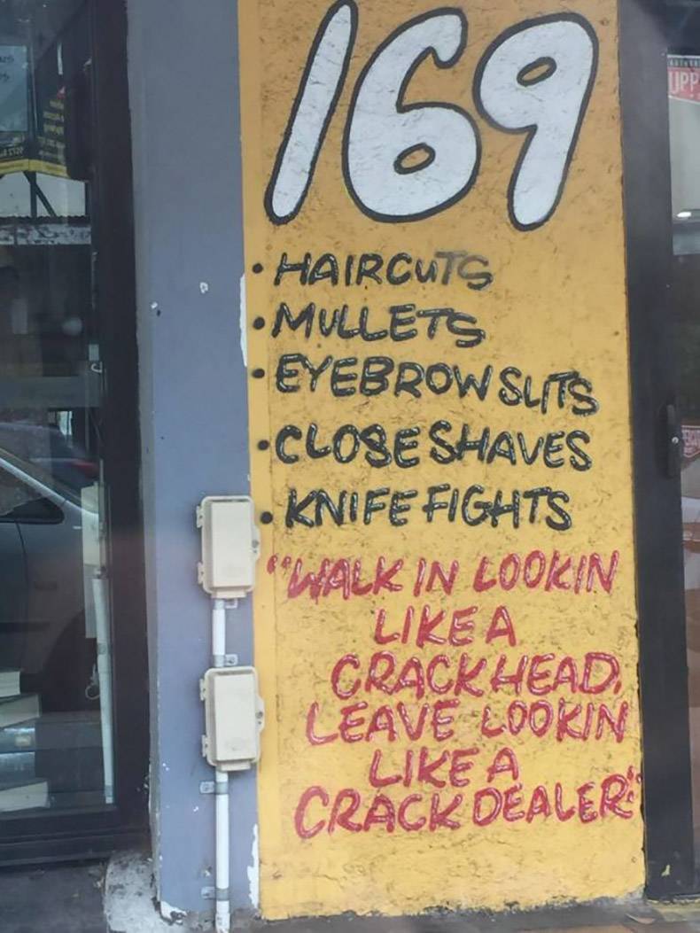 signage - 169 Haircuts .Mullets Eyebrow Slits Close Shaves Knife Fights Falk In Lookin a Crackhead Leave Eoorin A Crack Dealer