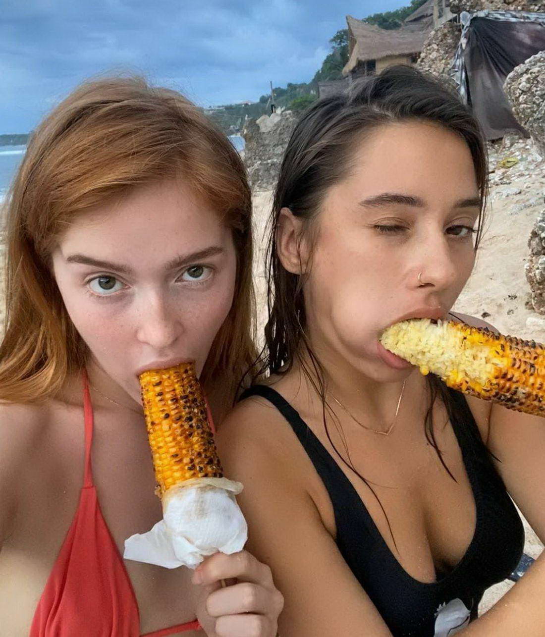 girls seductively eating corn on the cob