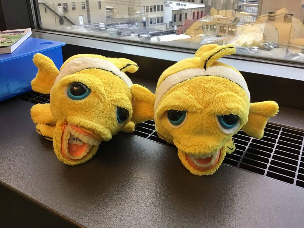 creepy yellow fish dolls