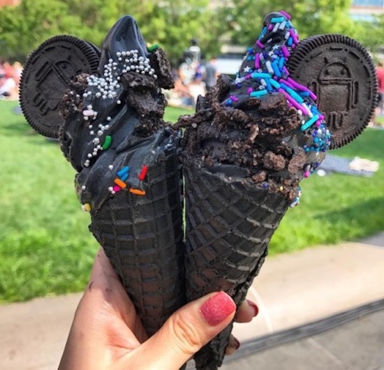 two all black ice cream cones