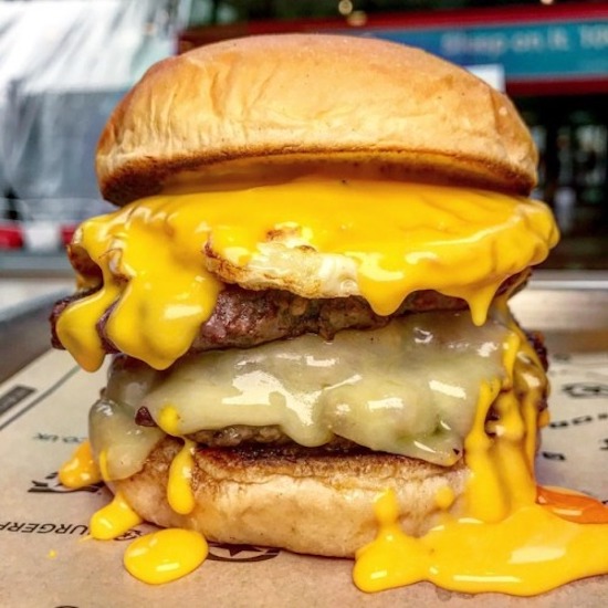 cheeseburger with melting gooey cheese