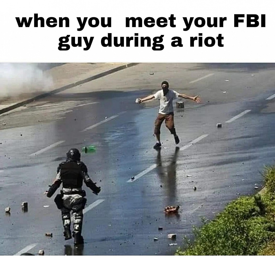 photo caption - when you meet your Fbi guy during a riot