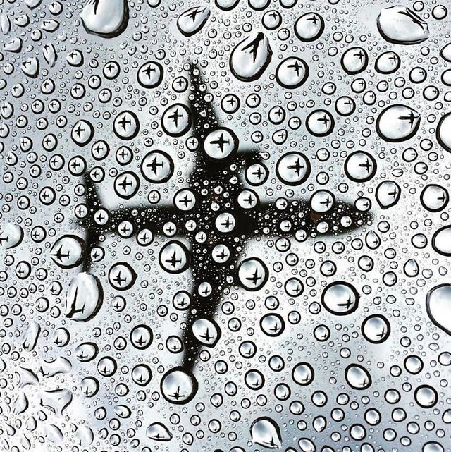 Believe it or not, this is not photoshopped....Amazing Photograph Of A Plane.