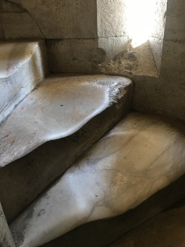 Well worn marble steps from Pisa's Tower.
