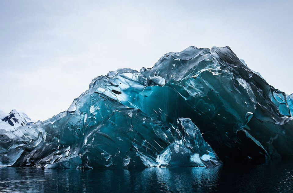 An Iceberg flipped over, and its underside is stunning...Like your moms hehehehehe