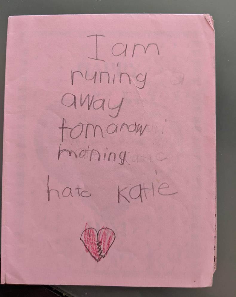 handwriting - I am runing away tomarow maninga hate Katie