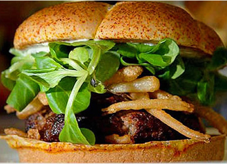 INGREDIENTS INCLUDE: Wagyu beef, white truffles, Pata Negra ham slices, Cristal onion straws, Modena balsamic vinegar, lambs lettuce, pink Himalayan rock salt, organic white wine and shallot infused mayonnaise in an Iranian saffron and white truffle dusted bun.
