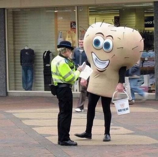 I'm not sure whats happening here.  It looks like a pair of testicles getting a ticket.  