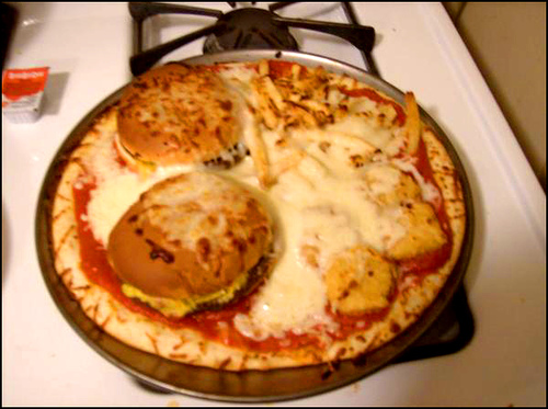 pizza with burgers on top