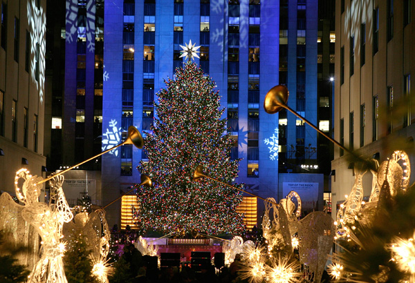  The Rockefeller Center Christmas tree is lit in New York, Wednesday, Dec. 3, 2008. (AP Photo/Diane Bondareff) 