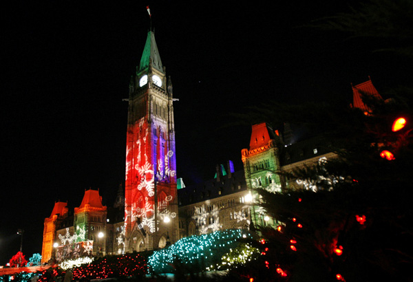 The Peace Tower and Parliament Hill are lit with giant snowflakes during the Christmas Lights Across Canada illumination ceremony in Ottawa on Thursday Dec. 4, 2008.(AP Photo/The Canadian Press, Sean Kilpatrick) 