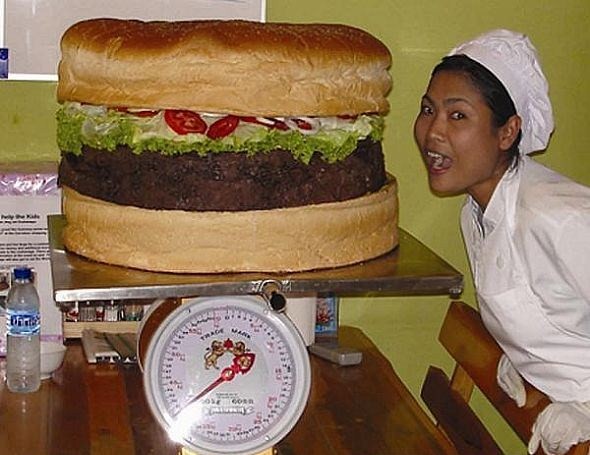 Check out this MONSTER Burger.  Time For a Chloresterol Check...