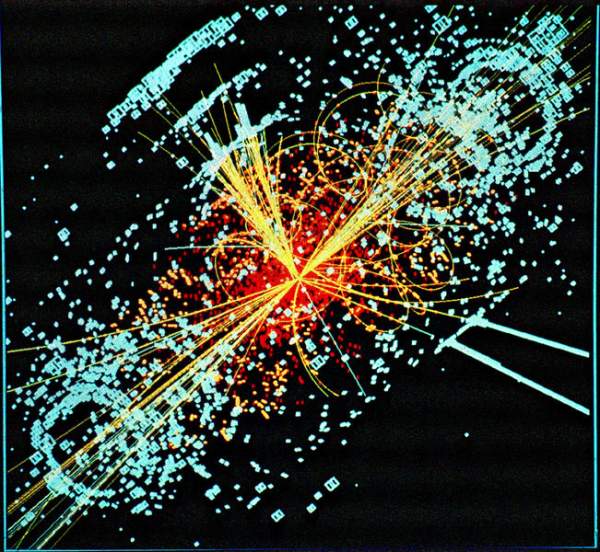 A simulated event at the LHC of the European particle physics Institute, the CERN.  This simulation is depicting the decay of a Higgs particle following a collision of two protons in the CMS experiment. Click to enlarge.