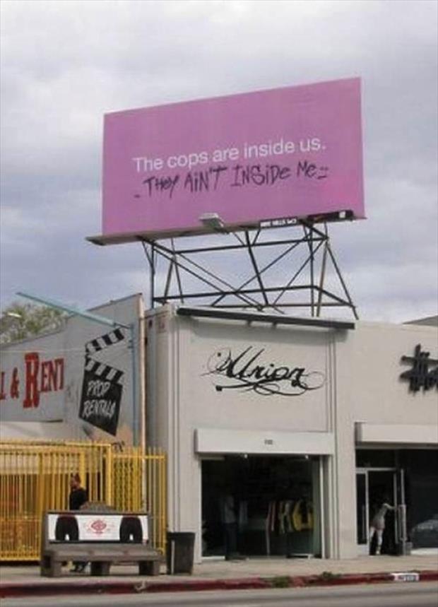 Vandalized billboard signs