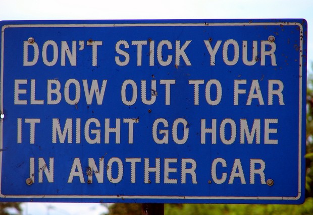 there's a story behind every sign - Don'T Stick Your Elbow Out To Far It Might Go Home In Another Car