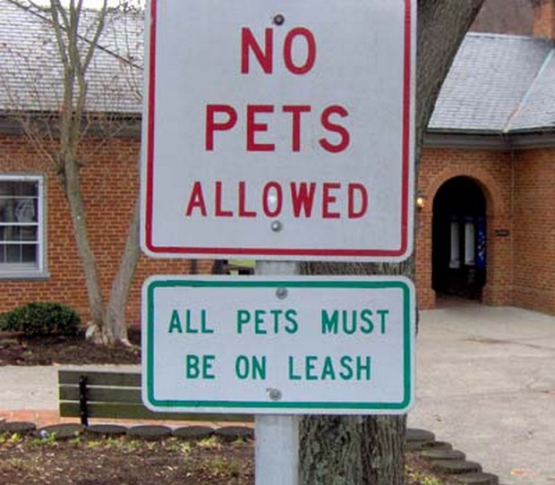 confusing signs - Pets Allowed All Pets Must Be On Leash