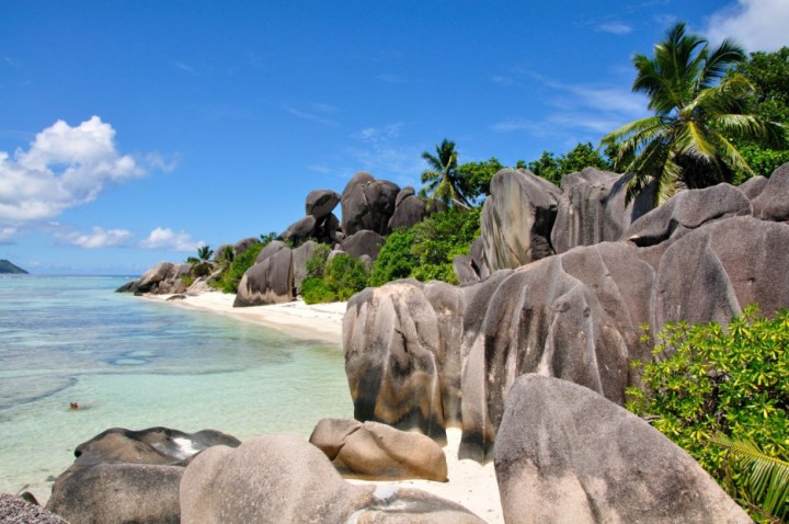 Anse Source dArgent, Seychelles - With pink sands and some of the coolest looking granite rocks lining its shores, its easy to see why this is one of the top destinations in the Seychelles.