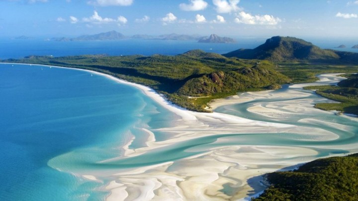 Whitehaven Beach, Australia - When the tide goes out, Hill Inlet turns into a winding river of white sand and turquoise water.
