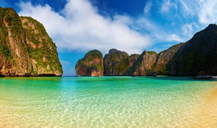 Maya Bay, Thailand - The bay is surrounded by large, plant covered rocks and was the filming location for the Leonardo DiCaprio movie The Beach.