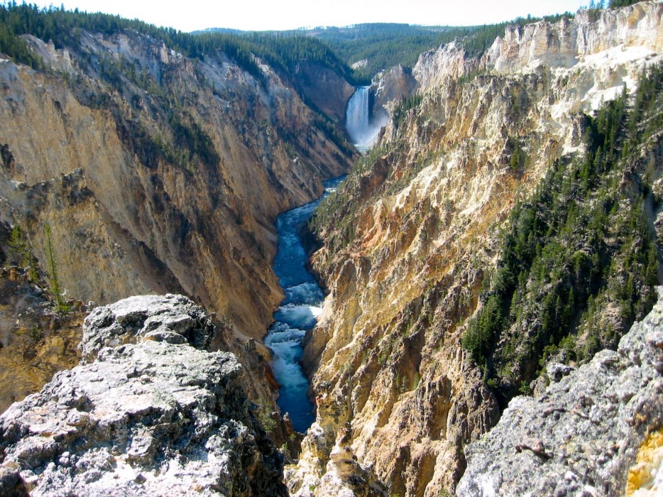 Yellowstone National Park is the oldest in the country and is best known for its many hot springs, such as Old Faithful and the Grand Prismatic Hot Spring, but it also has the Grand Canyon of the Yellowstone.