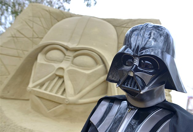 Opening of the world's first science fiction-themed sand sculpture exhibition at Sandworld, Weymouth, Britain, March 29, 2013. Brian Muir, who created the Darth Vader and Storm Trooper "Star Wars" costumes was a guest of honor.