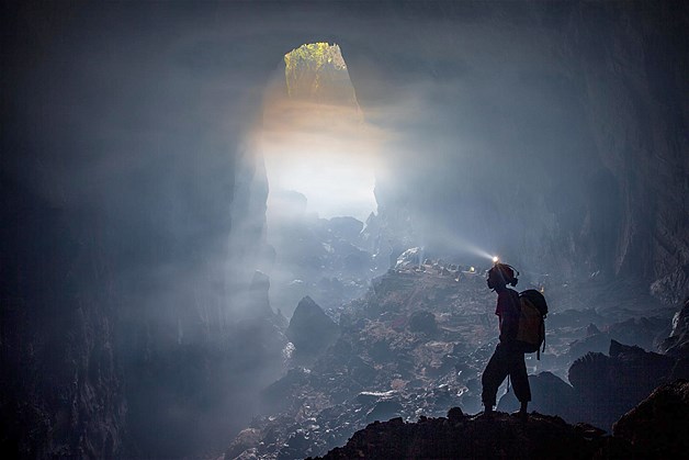 The huge temperature difference creates moving clouds of mist, especially near the two karst windows, which gives the cave its magically surreal atmosphere.