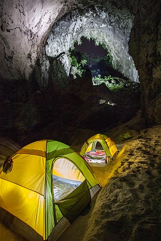 John Spies: I have spent many nights camped deep inside dark caves and it makes you feels very vulnerable, being so far from light. With our cave camps set on sandy beaches near the karst windows, it is easy to forget you are many kilometres underground."