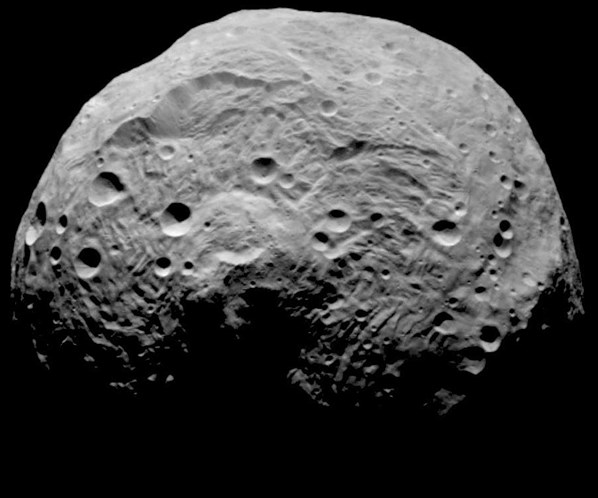 An up-close look asteroid Vesta, the brightest asteroid in the solar system and the object which takes up about 10-percent of the entire mass of the main asteroid belt.