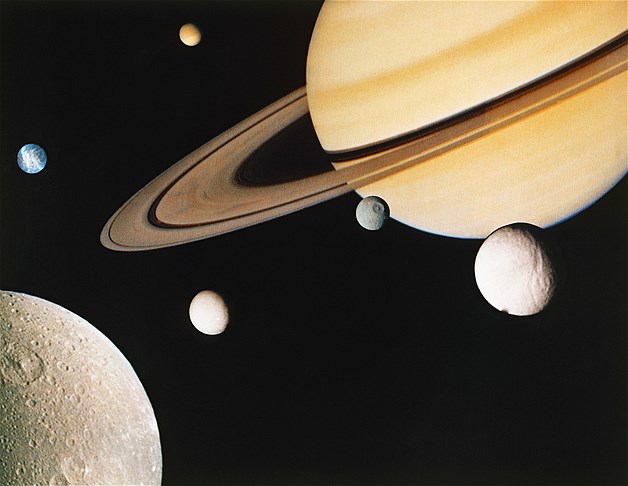 Montage of Saturn and six of the planet's moons, created from images taken by Voyager 1 back in November 1980.