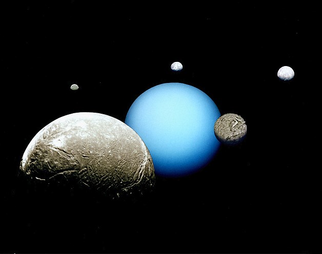 Uranus and its five major moons are depicted in this montage of images acquired by the Voyager 2 spacecraft.