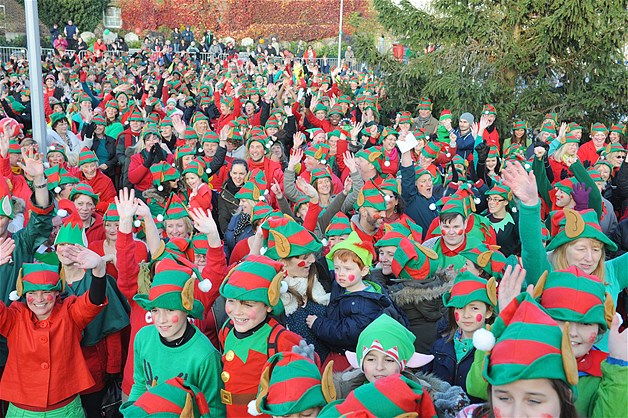 "Elves" celebrate their world record in Gravesend, Kent, Britain, Nov. 22, 2013. A group of 938 adults and children dressed as elves to break the record of the most elves in one place.