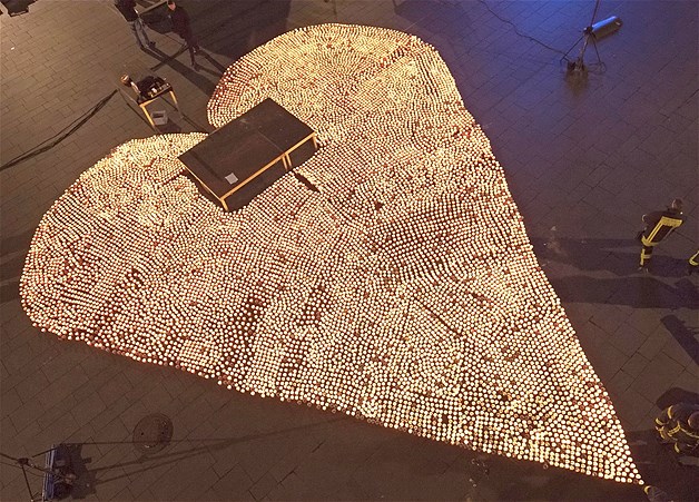 A construction of a heart shape using tea candles during the Festival of Lights in Halle Saale, eastern Germany, on Nov. 3, 2013. The organizers attempted to beat the existing Guinness World Record for forming a heart, using over 11,000 tea candles, in Austrian Wien back in 2006. This construction consisted of over 12,000 tea lights.