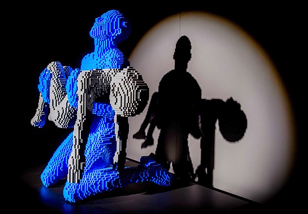 Transcending far beyond a kid's toy, these amazing art pieces were made snapping the popular plastic bricks together, creating scluptures like this one on display during "The Art of the Brick" exhibition by New York Lego artist Nathan Sawaya in Amsterdam, Netherlands, May 27, 2014.