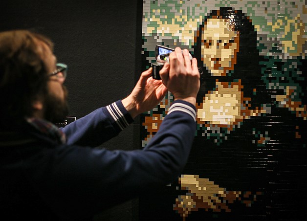 A Lego sculpture entitled ''Mona Lisa'' is displayed during the exhibition ''The Art of the Brick'' held at the Stock Exchange of Brussels, Belgium, Nov. 21 2013. The exhibition by New York-based artist Nathan Sawaya featured more than 70 of his sculptures.