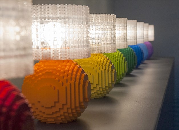 A row of multicolored lamps made from Legos featured in David Tracy's exhibit "A Million and One Pieces" at the Forest Lawn Museum in Glendale, California, April 30, 2014.