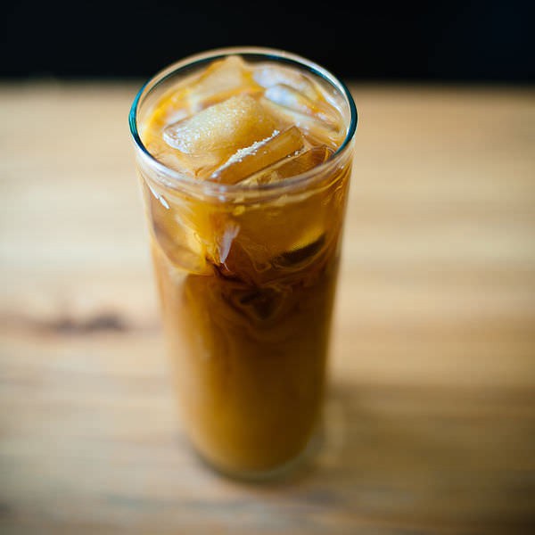 Iced coffee is more expensive because it uses more resources. From plastic cups to napkins to double brewing re-brewing coffee a second time to make it stronger, the resources needed for iced coffee are more numerous and expensive! than hot coffee is. All of that adds up, and it causes establishments to charge more for their iced drinks than their hot-beverage counterparts.