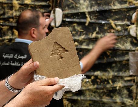 Bricks of hashish stamped with a Lebanese cedar, 85kgs of which were supposed to be shipped TO the Netherlands.