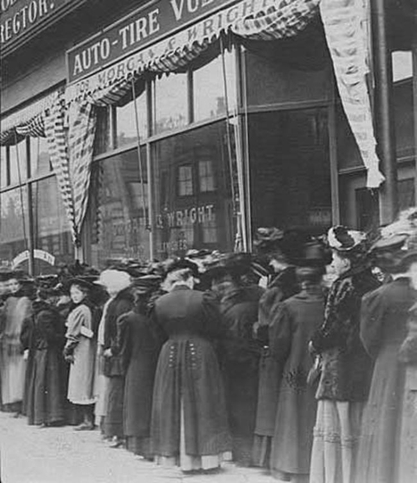 Minneapolis women lining up to vote for the first time in a presidential election. 1920