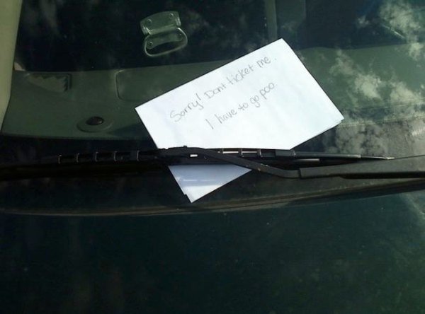 note on windshield - Sorry! Dont ticket me. I have to go poo