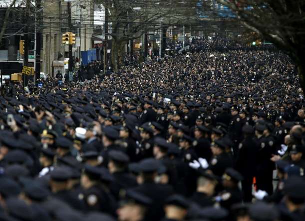 28,000-The approximate number of police officers who gathered from around the United States to attend the funeral of Officer Wenjian Liu.