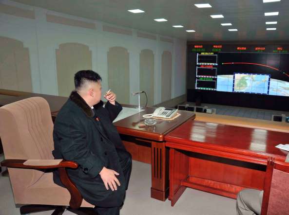 According to Kim Jong-il's chef, Kim Jong-un likes smoking Yves Saint Laurent cigarettes and drinking Johnny Walker whisky. Pictured Kim Jong-Un smoking a cigarette at the General Satellite Control and Command Center in 2012.