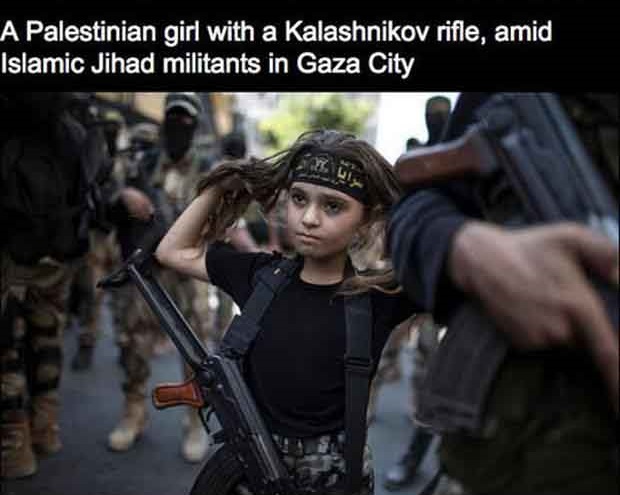 palestinian child soldiers - A Palestinian girl with a Kalashnikov rifle, amid Islamic Jihad militants in Gaza City