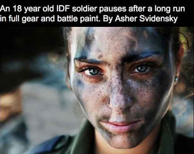 asher svidensky - An 18 year old Idf soldier pauses after a long run in full gear and battle paint. By Asher Svidensky