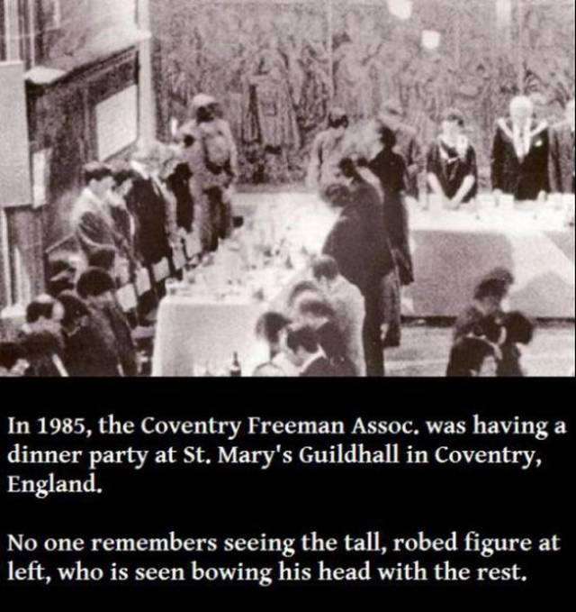 real life real ghost stories - In 1985, the Coventry Freeman Assoc. was having a dinner party at St. Mary's Guildhall in Coventry, England. No one remembers seeing the tall, robed figure at left, who is seen bowing his head with the rest.