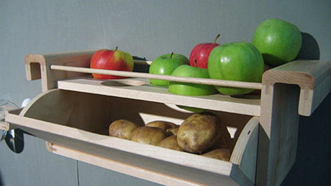 Store apples and potatoes together. Ethylene gas from apples keeps potatoes from sprouting.