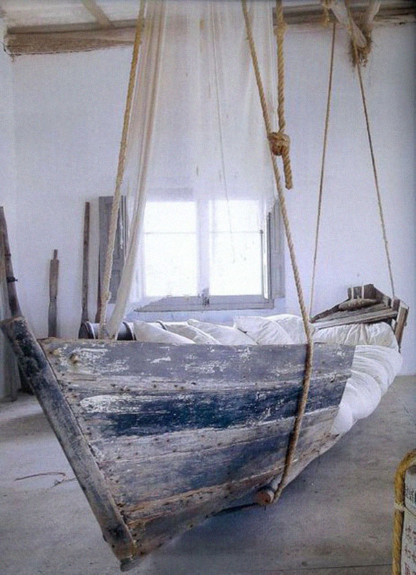Old Boat Turned Into Hanging Beds