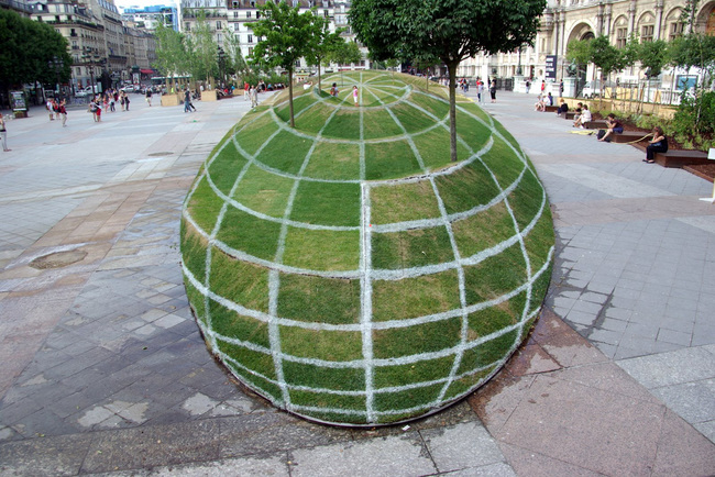 This park in Paris looks like it has a giant 3D globe...