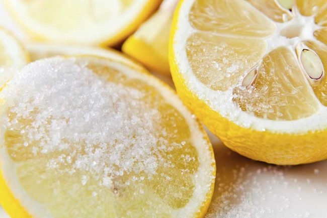 Sugar, olive oil, and lemon make an exfoliating hand scrub.