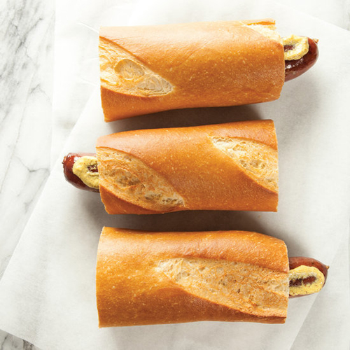 Le Hot Dog: Hot dog wrapped in a toasted baguette with spicy mustard.