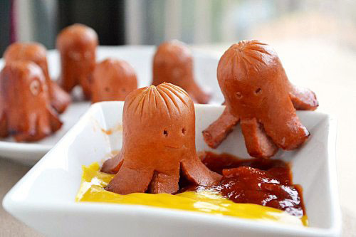 Octopus Sausages: These are ridiculously easy to make. All you have to do is slice the ends off of a couple hot dogs, make six slits in the bottom, and brown the suckers in hot oil. As they cook, the little legs naturally start to curl, and when you turn the sausages to brown all sides, the legs bloom outwards in octopus-y fashion. Very cool.